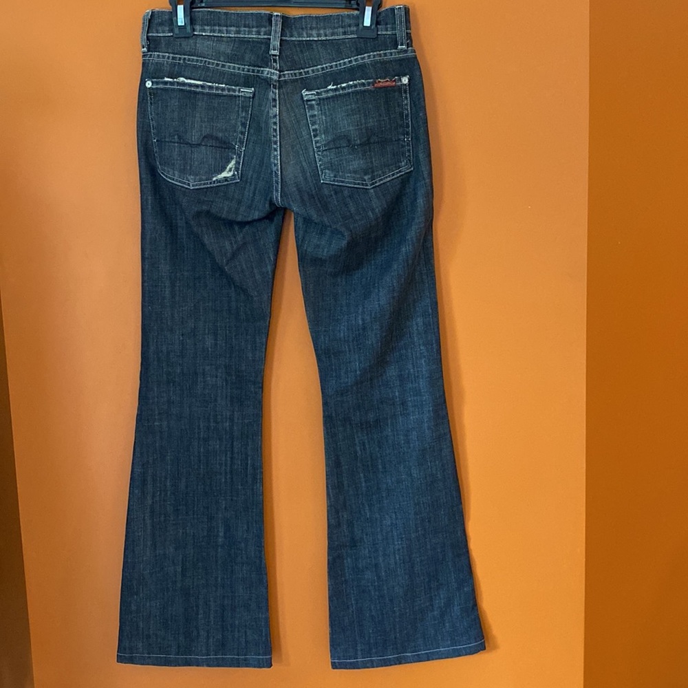 7for all mankind ladies jeans in size 27. Faded black distressed denim-Flare leg
